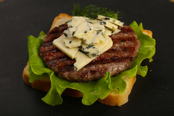 Sandwich with blue cheese and burger cutlet