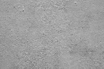 Wall fragment with scratches and cracks