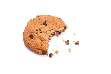 Single round chocolate chip biscuit with crumbs and bite missing, isolated on white from above.