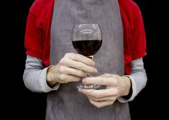 Barista holding freshly brewed coffee in glasses
