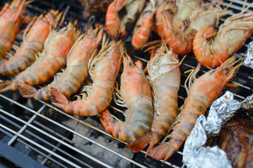 shrimps grilled on the charcoal stove, bbq seafood