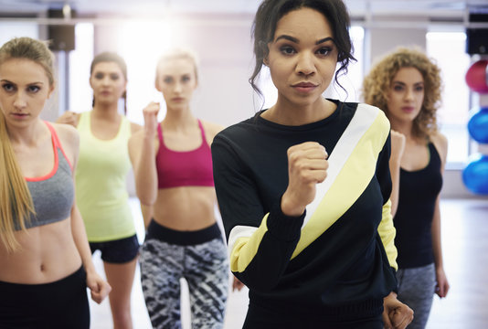 Five of women working hard in the gym class