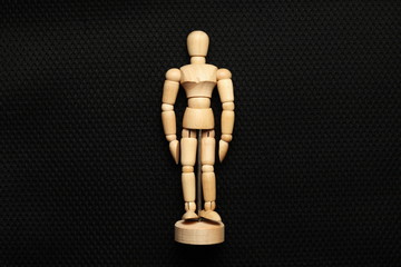 A wooden art doll represent the art and action concept related idea.