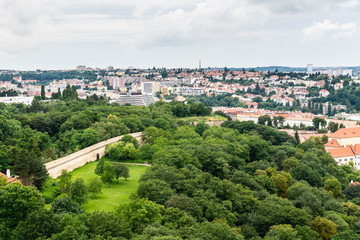 Fototapeta na wymiar Top view to old town, Petrin park, in Prague, Czech republic from an observation deck on Petrin hill.