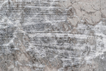 White streaks of paint on concrete