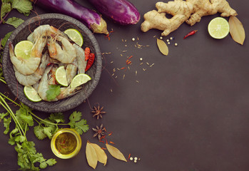 Food ingredients on black background - creating recipe concept