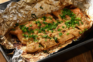 Baked salmon trout. Cooking process.