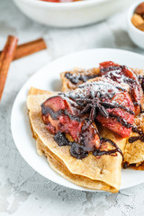 pancakes, baked fruit, berries, spices, apples, oranges, blackberries, honey, dessert, pastry, confectionery, bakery, breakfast, traditional cuisine, national cuisine, Russian cuisine,