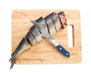 preparation of herring on a board on a white background