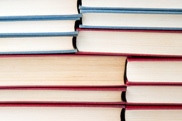 pile of books stacked on top of each other