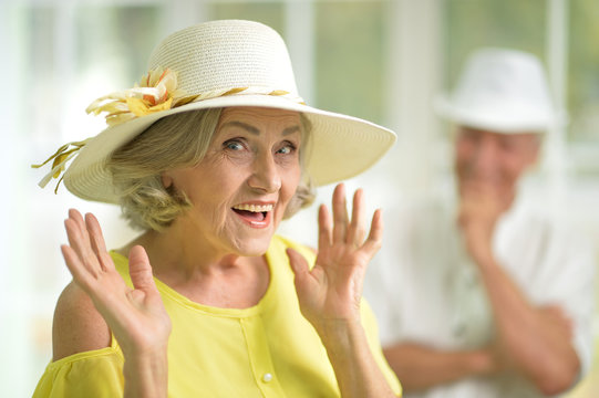 Excited Senior Woman In Hat 