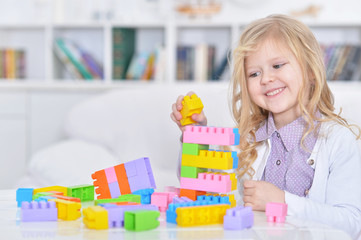 girl playing Bricks game