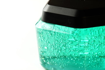The hair styling gel clear bottle with black color lid represent the beauty and hair make up concept related idea.