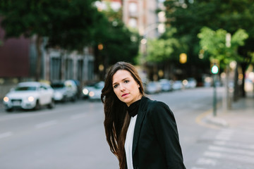 Fototapeta premium Woman waiting on crossroad