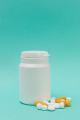 Capsules, Pills, and a Medicine Bottle with Copy Space