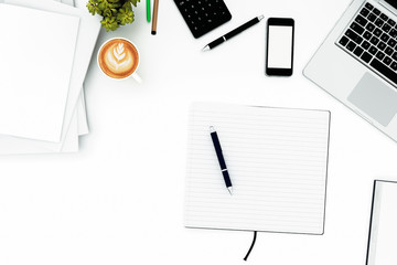 Office desk table with labtop computer,blank magazinesmart phone and coffee cup Top view with copy space,3D rendering