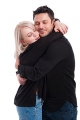 Cute young lovers hugging with love