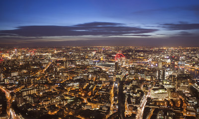 Obraz premium aerial view of London city in United Kingdom. Night scene photo with long exposure