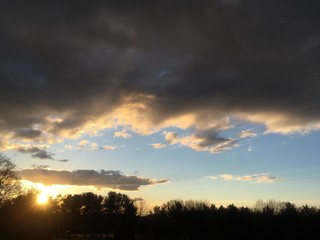 Fototapeta premium winter sunrise with partly cloudy sky