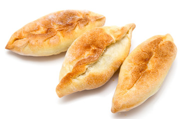 pies with cabbage on a white background