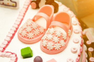 Cake with booties pink for girls