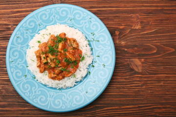 Rice with meat in tomato sause