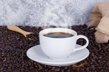 hot Coffee cup and beans