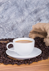 hot Coffee cup and beans