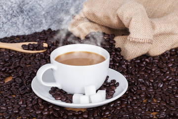 hot Coffee cup and beans
