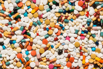 Fototapeta na wymiar Multiple pills depicting medical treatment or pahrmaceutical industry. High resolution image.