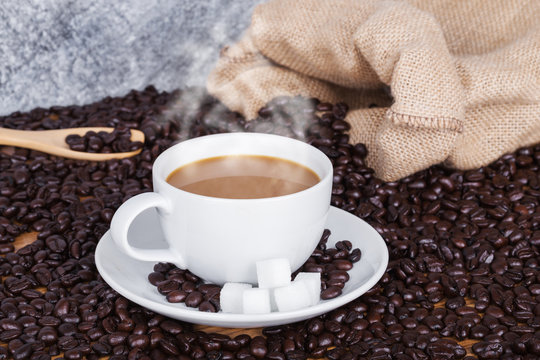 hot Coffee cup and beans