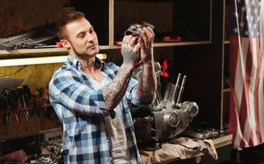 Portrait of serious man posing with detail