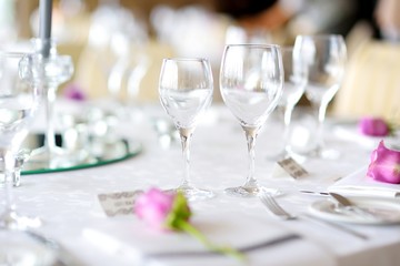 Beautiful table setting with crockery and flowers for a party, wedding reception or other festive event