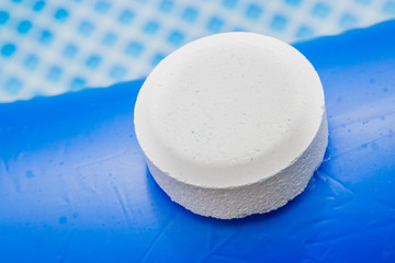 Chlorine Pellets on the edge of an inflatable pool