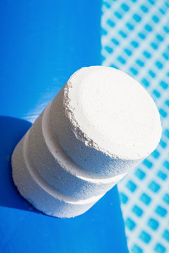 Chlorine Pellets on the edge of an inflatable pool