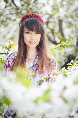 woman resting in a cherry garden