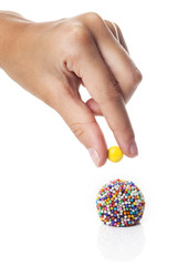 Traditional candy from Brazil called brigadeiro over white background