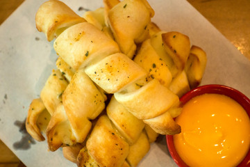 breadsticks with cheese and sauce