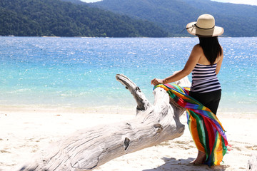 Asian girl on the beach Koh Lipe Thailand.