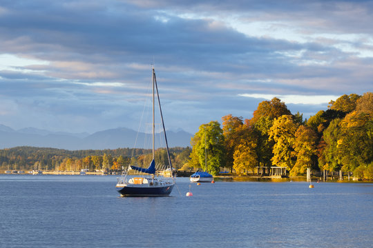 Germany, Bavaria, sailing ship on Lake Starnberg in the morning
