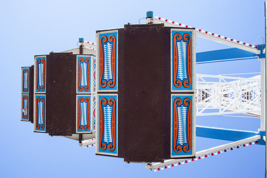 Germany, Munich, gondolas of ferris wheel at the Oktoberfest seen from below