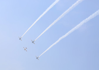 group of aircraft of the royal thai air force were smoking Under The Royal Sky at Royal Thai Airforce Base Donmuang in the children day.