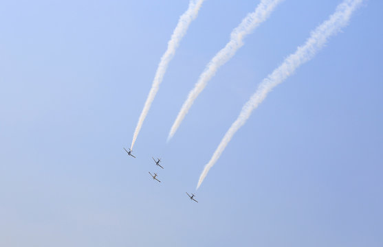 group of aircraft of the royal thai air force were smoking Under The Royal Sky at Royal Thai Airforce Base Donmuang in the children day.