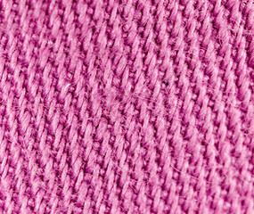 pink fabric as a background. macro