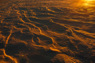 Martian sunset (Mars planet) red landscape. Looks like cold desert on Mars. A huge field of ice