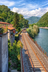 Naklejka premium Railroad along river in Italy