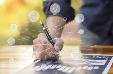 businessman hand working with new modern computer and business strategy as concept