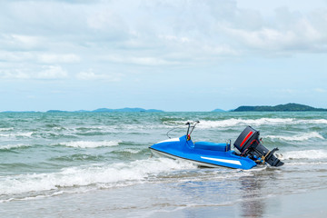 Fototapeta na wymiar Beach and sea with blue sky and water scooter boat