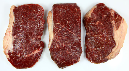 Red beff steak on white background