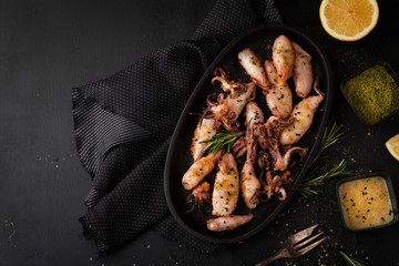 Grilled squid in breadcrumbs with lemon and spices